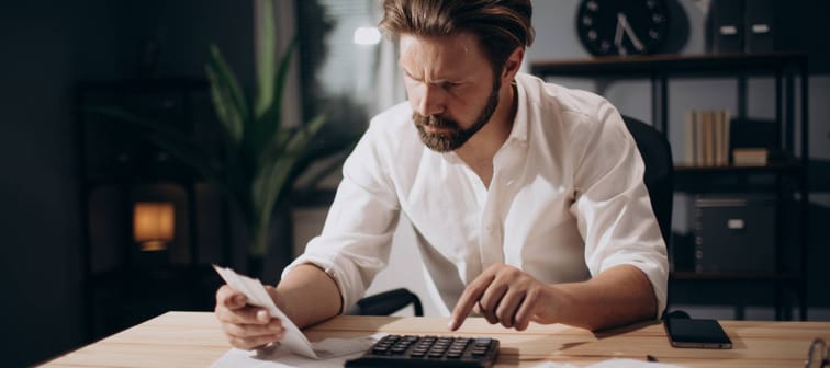 Man with calculator